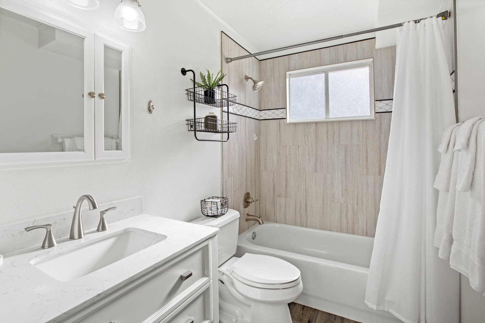 bathroom with white toilet and sink